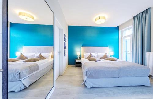 Ostseebad Wustrow Apartamento | Boddenzeit - Moderne Ferienwohnung mit Nordbalkon, Wellnessbereich und Nähe zum Ostseestrand