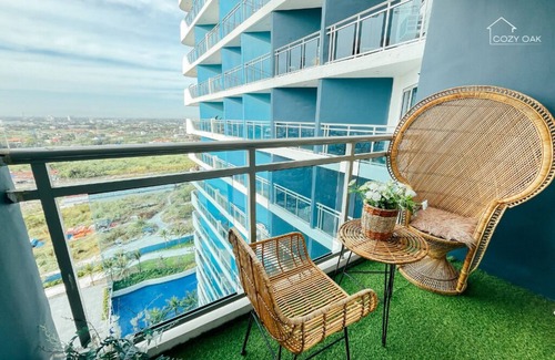 San Fernando Condominio | Boho-Themed Studio with Pool View Balcony, Netflix, Karaoke & Boardgames