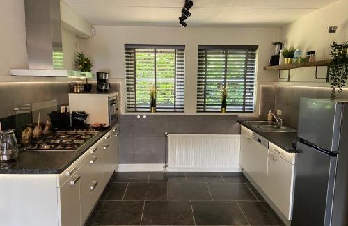 Lunteren Casa | Bosboerderij de Goudsberg met hottub in tuin
