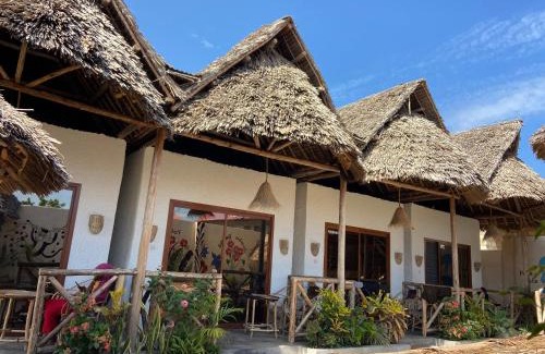 Nungwi Hotel | BOUGAIN VILLA -nice for couple