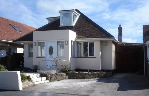 Southbourne Casa | BOURNECOAST: CHALET BUNGALOW CON GRAN PATIO CON VISTAS A LA PLAYA DE ARENA-HB2656