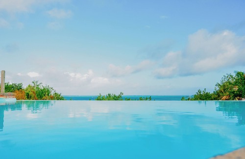Trou d'Eau Douce Villa | Villa boutique en las rocas con desayuno, playa y piscina