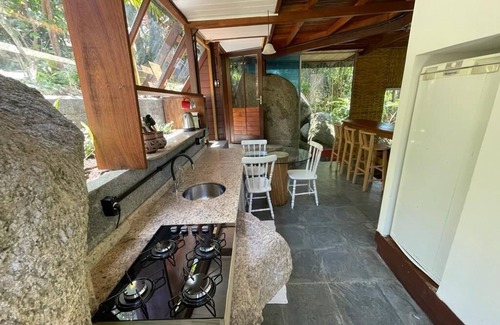 Florianopolis Cabina | Pyramid house covered in quartz. Space for healing and regeneration connections.
