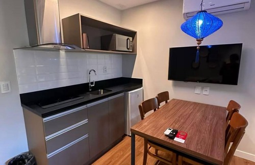 Campos do Jordao Hotel | SUITE WITH BALCONY, JACUZZI AND COMPLETE MINI KITCHEN.