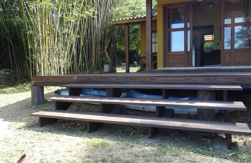 Florianopolis Casa | Delightful house on land with 5 beaches! Feet in the sand and peace!