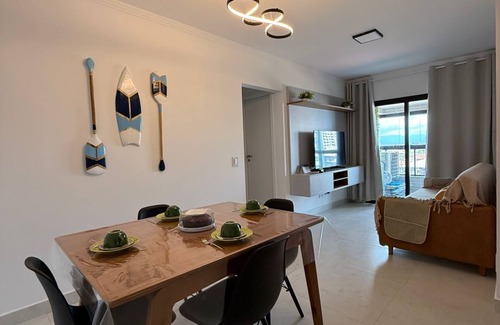 Praia Grande Apartamento | Brand new apartment right on the sand with sea view.