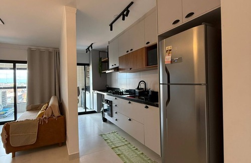 Praia Grande Apartamento | Brand new apartment right on the sand with sea view.