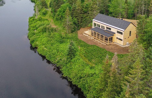 Mauricie Casa | Breathtaking Escape w/ Fireplace, BBQ, Wellness & Soothing Du Loup river View