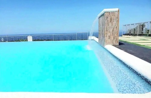 Ocho Rios Casa | Breathtaking Ocean-view, hot-tub, pool, rooftop access & grill