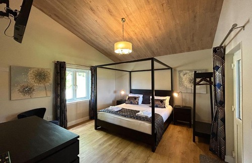 East Lewiston Chalet De Esquí | Breckland Lodge 3 with Hot Tub