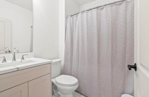 Cedar Falls Casa | Brick Beauty Downtown, 3BR, Fenced Yard, Garage!