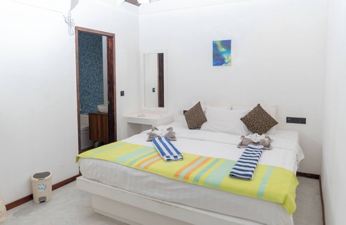 Rasdhoo Cama Y Desayuno | Brickwood Ganduvaru