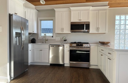 Gardens Condominio | Bright & airy beach retreat with bay views