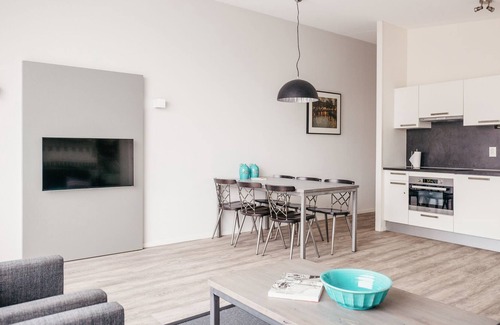 Haarlemmerbuurt Apartamento | Luminoso y moderno apartamento de dos habitaciones con vista al canal.