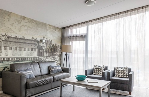 Haarlemmerbuurt Apartamento | Luminoso y moderno apartamento de dos habitaciones con vista al canal.