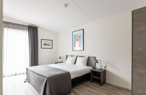 Haarlemmerbuurt Apartamento | Luminoso y moderno apartamento de dos habitaciones con vista al canal.