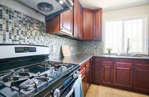 Hacienda Heights Casa | Bright Bliss Retreat: 3-Bedroom, 1-Bathroom Retreat near LA with High-Speed Internet, Central AC, Full Kitchen, and On-Site Laundry.