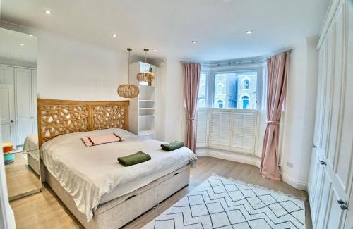 Larkhall Apartamento | Bright Cozy Garden Retreat w Fast Wifi & 5min to Tube Subway Metro & Close to Park & Street Parking P4P