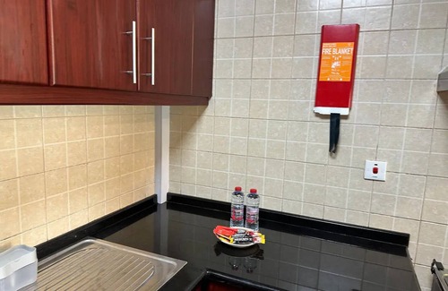 Discovery Gardens Condominio | Bright renovated 1 Bedroom Next to Metro Mall