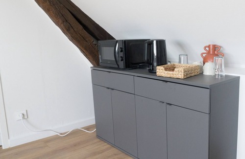 Coteaux Ouest Apartamento | Bright studio under the roof