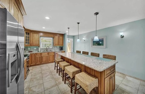 Hutchinson Island South Casa | Bring your boat and come enjoy island life in this canal front home!