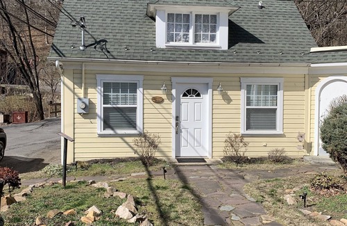 Berkeley Springs Cabaña | Brookside Cottage is a beautiful open concept doll house stay for two.