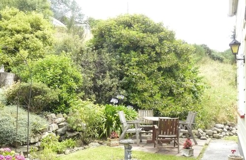 Dunedin Cabaña | Brookside cottage es una casa encantadora, acogedora,