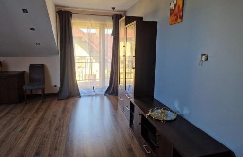 Pierwoszyno Casa | Brown room F in house