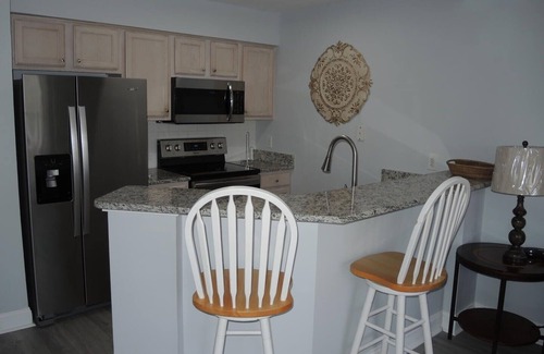 Calabash Condominio | Brunswick Plantation Resort and Golf Condo 307M with Outdoor Pool by RedAwning