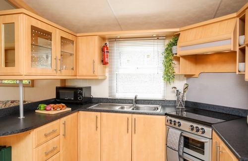Dulas Cabaña | BRYN HYFRYD CARAVAN, family friendly, with a garden in Moelfre