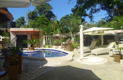 Playa Chiquita Apartamento | Budget guest-friendly room near casino and beach