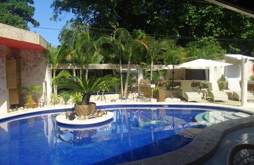 Playa Chiquita Apartamento | Budget guest-friendly room near casino and beach