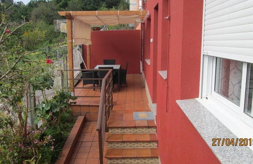 Bueu Apartamento | Bueu: Apartamento con terraza y vistas al mar a 300 metros de la playa