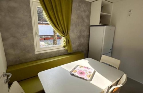 Oliveto Lario Casa | Bungalow 'Casa Mobile 8' con terraza privada, jardín compartido y aire acondicionado