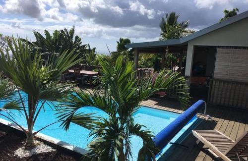 Bois de Nefles Chalet De Esquí | Bungalow cosy avec piscine surplombant l'océan