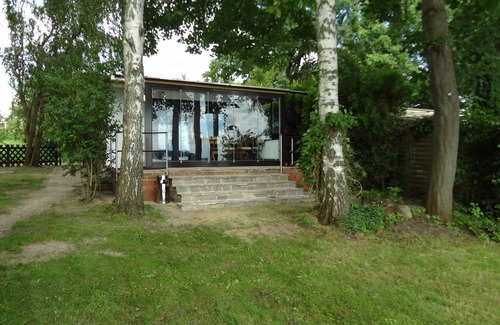 Bad Saarow Casa | Bungalow directamente en el lago con jardín de invierno, muy privado - Ferienhof Löschebrand
