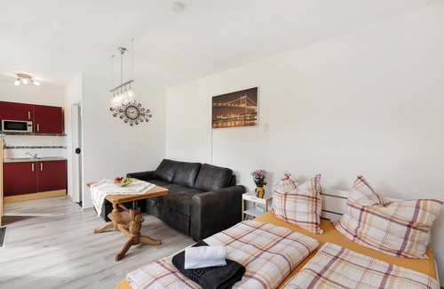 Nordhausen Casa | Bungalow 'Ferienhaus Sonne' con terraza privada, jardín compartido y Wi-Fi