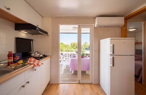 Puntone Casa | Bungalow with pool in a park-like garden by the sea!