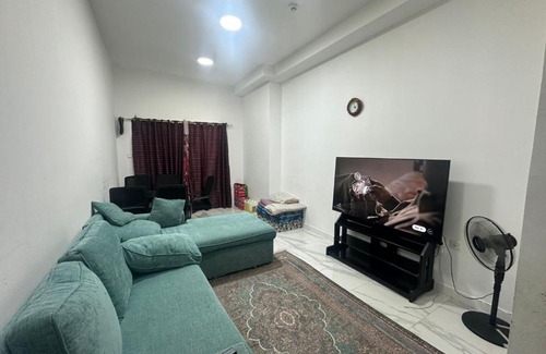 Emirates City Apartamento | Burj al haya apartment