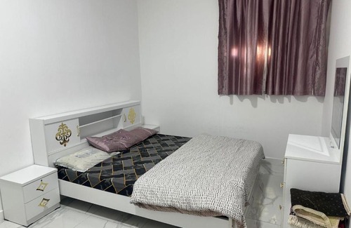 Emirates City Apartamento | Burj al haya apartment