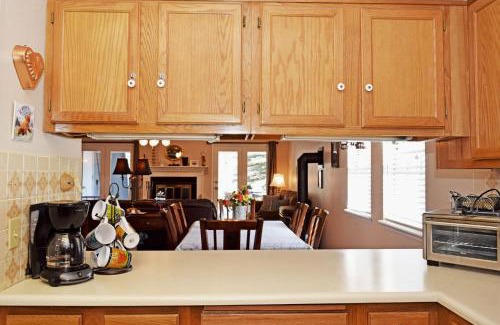 Red River Casa | By the River - On The River - WiFi - Cable - Washer - Dryer - Wood Burning Fireplace - Covered Back Deck