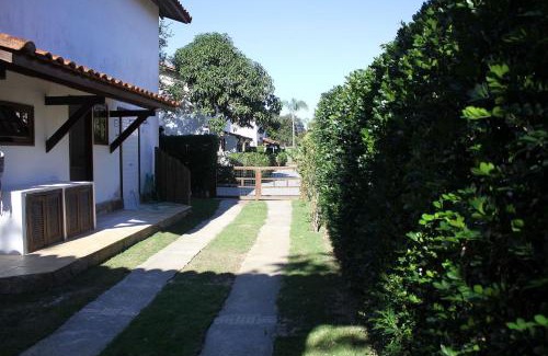 Praia Rasa Casa | Bz10 Linda casa! 4 suítes em condomínio clube!