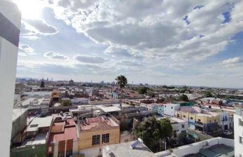 San Juan de Dios Apartamento | Céntrico y estiloso apartamento con Alberca, AC, Seguridad, Aparcamiento y Gym