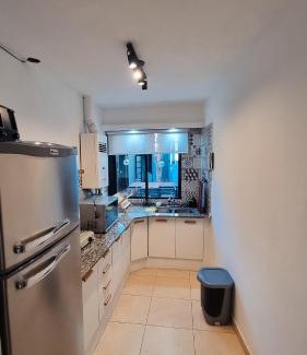 San Juan Apartamento | Cómodo departamento con jardín sobre Avenida Libertador