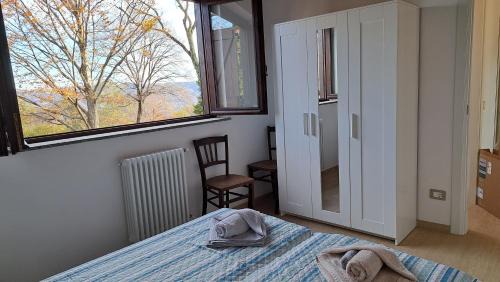 Madonna del Sasso Apartamento | Ca' nel Bosco