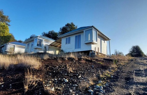 Rilan Casa | Cabaña Carpintero negro