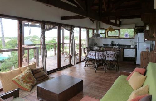Pinamar Casa | Cabaña en la playa. ventanales y terraza al mar
