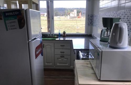 Balcarce Chalet De Esquí | cabaña vista a la sierra
