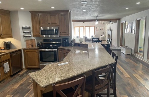 New London Casa | Cabin Style Home in Woods, Private Pool, Hot Tub, Snowmobile, Fire Pit, Horses.