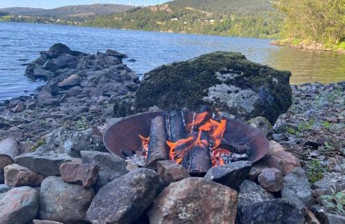 Fitjar Apartamento | Cabin with a view to water